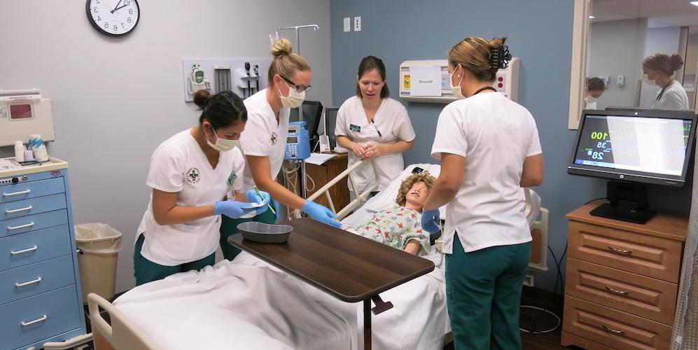 Nursing students work in star lab